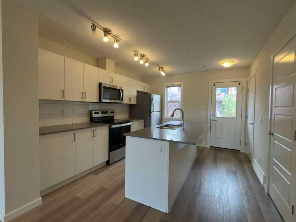 MLS® A2250461 - 443 Cranbrook Square SE in Cranston Calgary, Residential