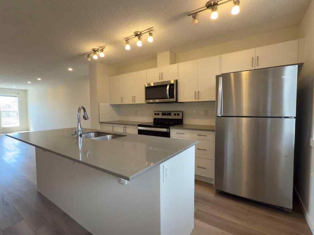 MLS® A2250461 - 443 Cranbrook Square SE in Cranston Calgary, Residential