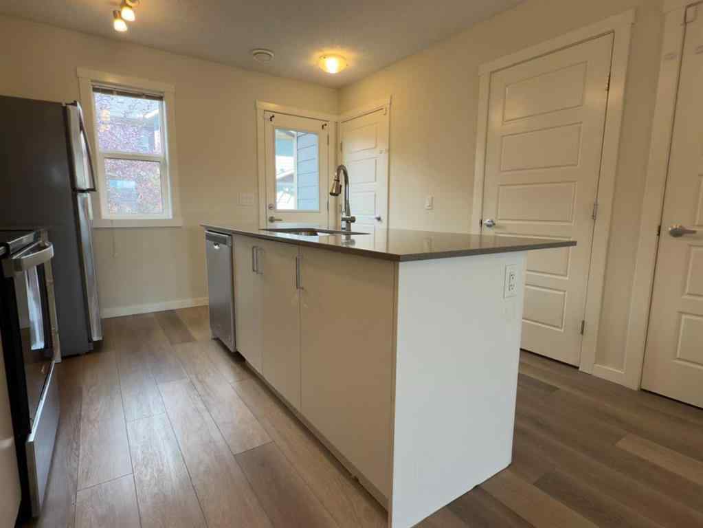 MLS® A2250461 - 443 Cranbrook Square SE in Cranston Calgary, Residential