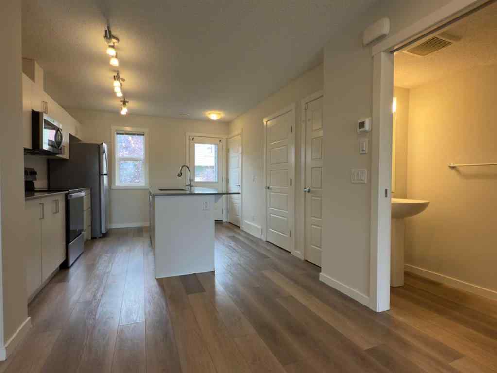 MLS® A2250461 - 443 Cranbrook Square SE in Cranston Calgary, Residential