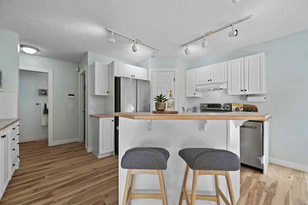 MLS® A2250474 - 63 Arbour Stone Close NW in Arbour Lake Calgary, Residential