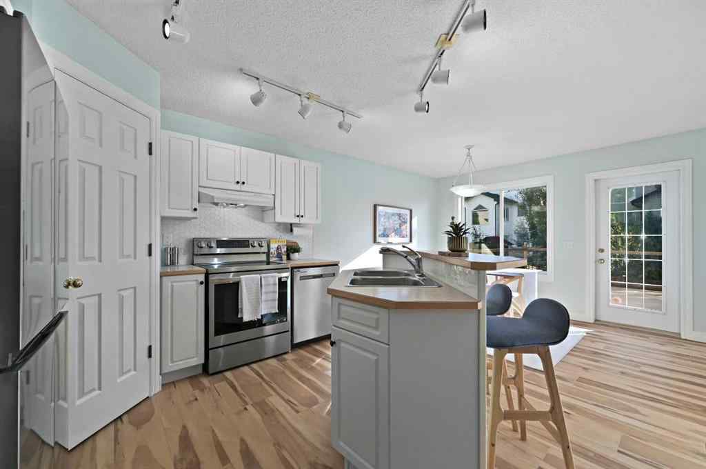 MLS® A2250474 - 63 Arbour Stone Close NW in Arbour Lake Calgary, Residential