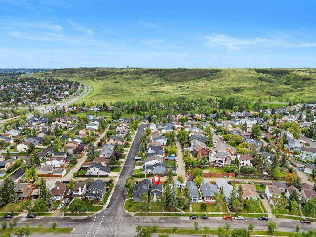 MLS® A2250476 - 55 Macewan Drive NW in MacEwan Glen Calgary, Residential