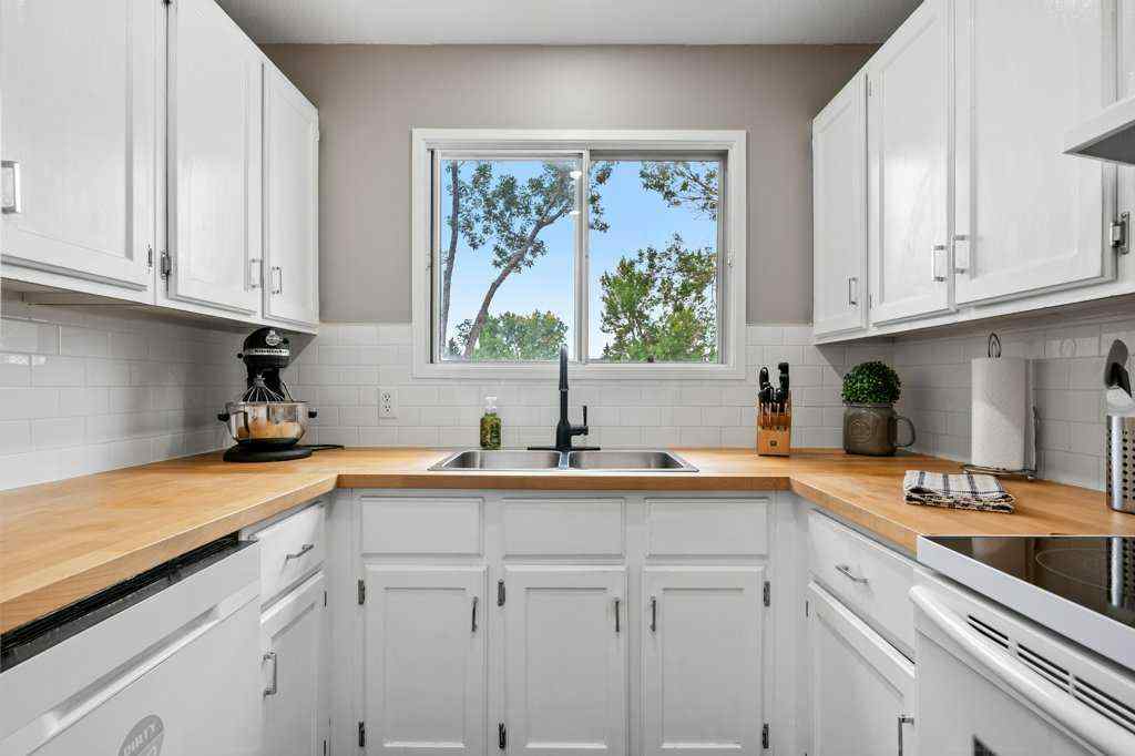 MLS® A2250476 - 55 Macewan Drive NW in MacEwan Glen Calgary, Residential