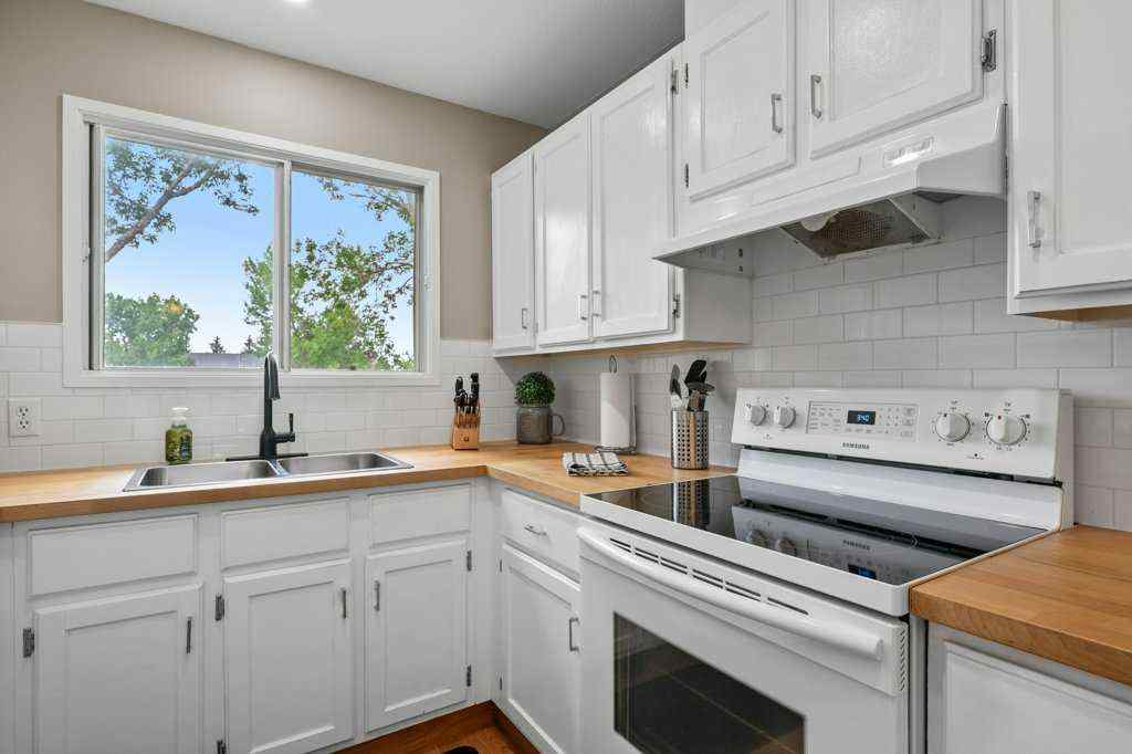 MLS® A2250476 - 55 Macewan Drive NW in MacEwan Glen Calgary, Residential