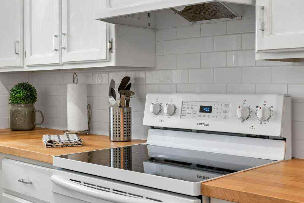 MLS® A2250476 - 55 Macewan Drive NW in MacEwan Glen Calgary, Residential