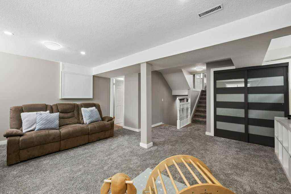 MLS® A2250476 - 55 Macewan Drive NW in MacEwan Glen Calgary, Residential