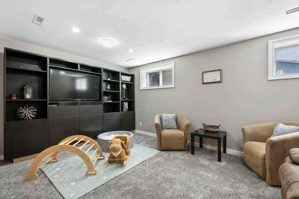 MLS® A2250476 - 55 Macewan Drive NW in MacEwan Glen Calgary, Residential