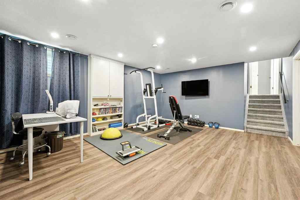 MLS® A2250477 - 87 Macewan Park Circle NW in MacEwan Glen Calgary, Residential
