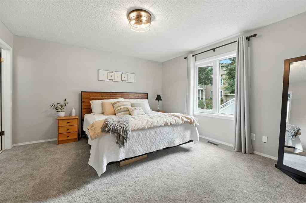 MLS® A2250477 - 87 Macewan Park Circle NW in MacEwan Glen Calgary, Residential