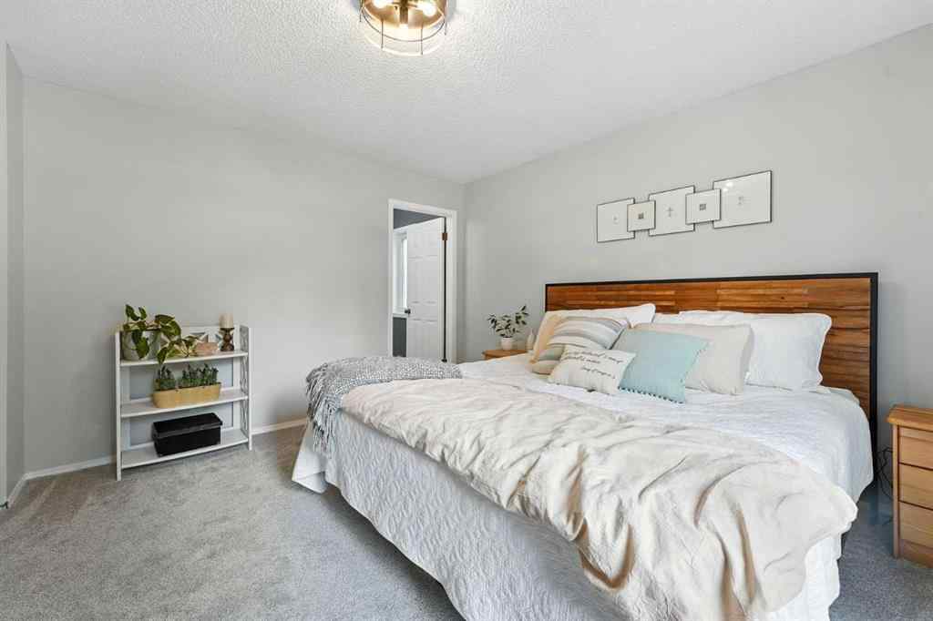 MLS® A2250477 - 87 Macewan Park Circle NW in MacEwan Glen Calgary, Residential