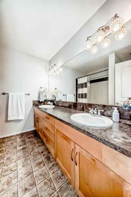 MLS® A2250494 - 128 LAVENDER Way  in Rainbow Falls Chestermere, Residential