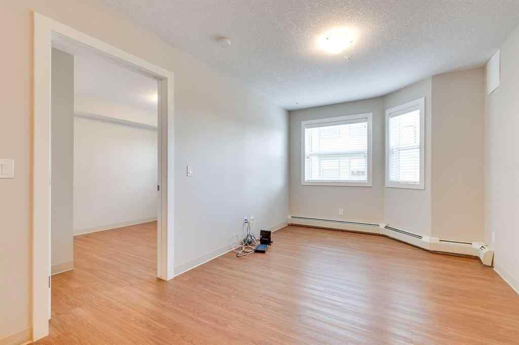 MLS® A2250503 - Unit #106 2635 Eversyde Avenue SW in Evergreen Calgary, Residential