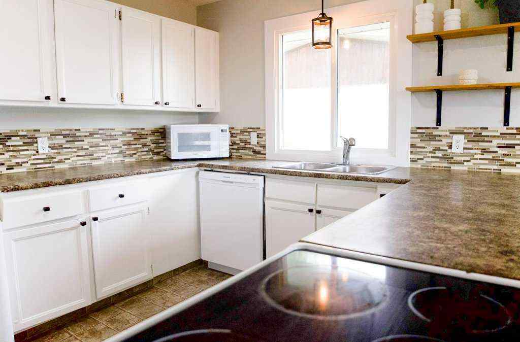 MLS® A2250504 - 12 Eagle Road  in Fairway Heights Lacombe, Residential