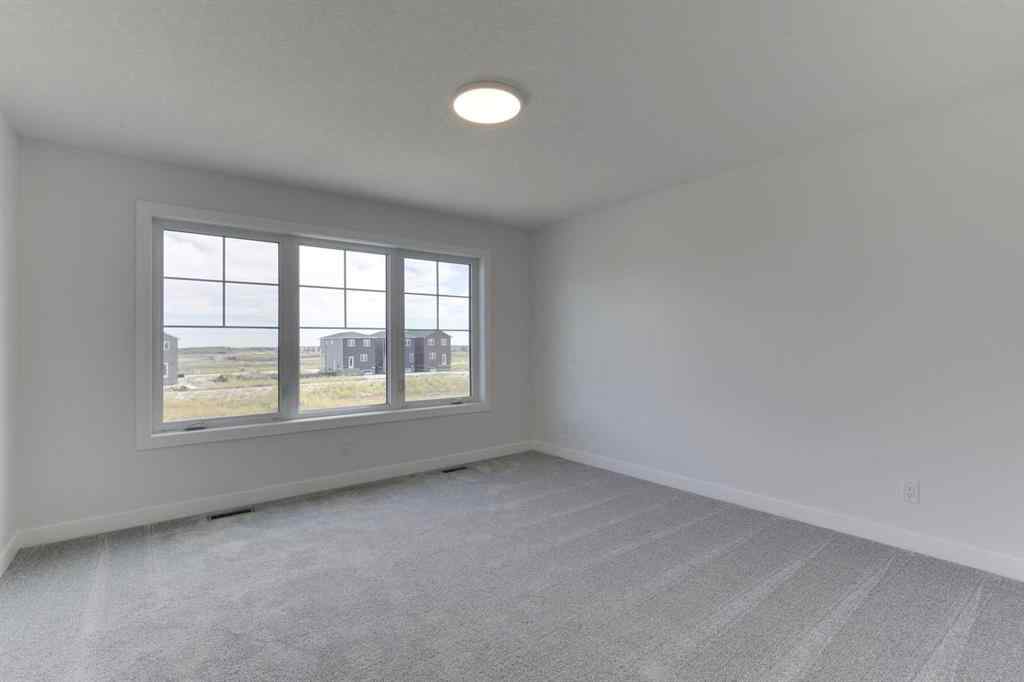 MLS® A2250516 - 477 Hotchkiss Drive SE in Hotchkiss Calgary, Residential