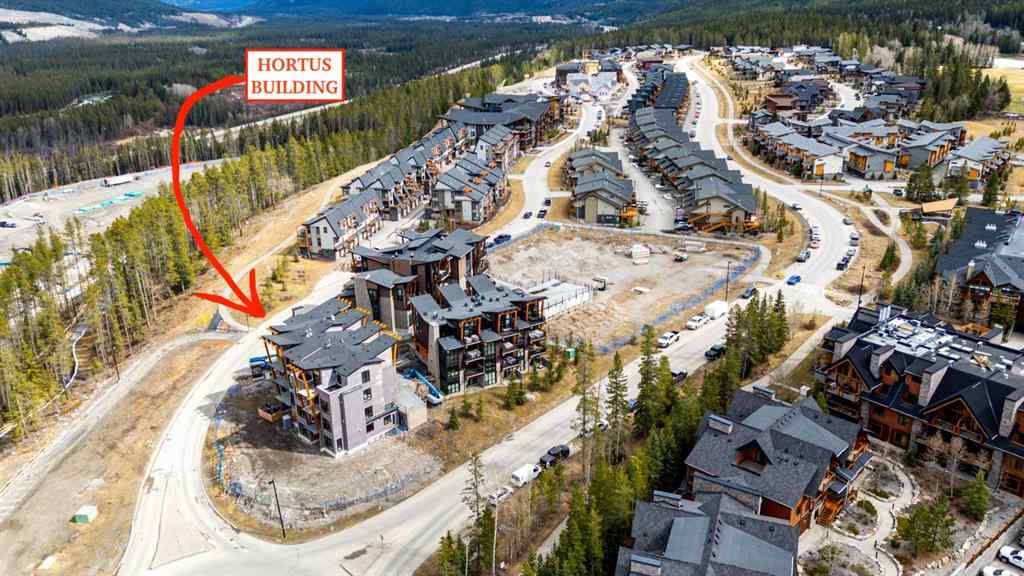 MLS® A2250520 - Unit #821 101H Stewart Creek Rise  in Three Sisters Canmore, Residential