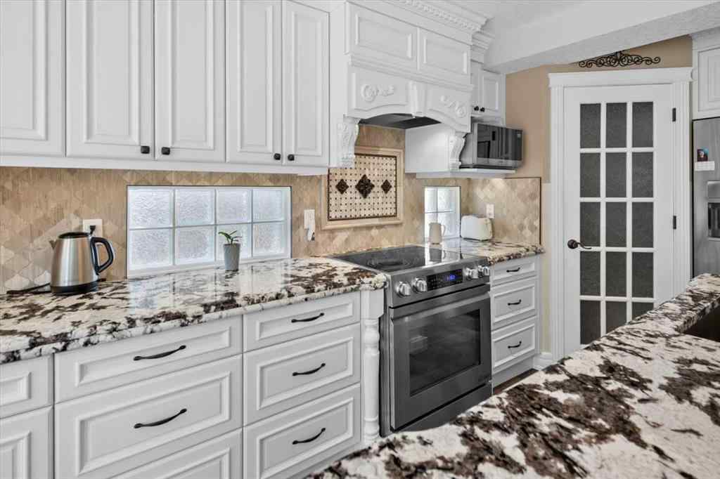 MLS® A2250523 - 9124 Edgebrook Drive NW in Edgemont Calgary, Residential