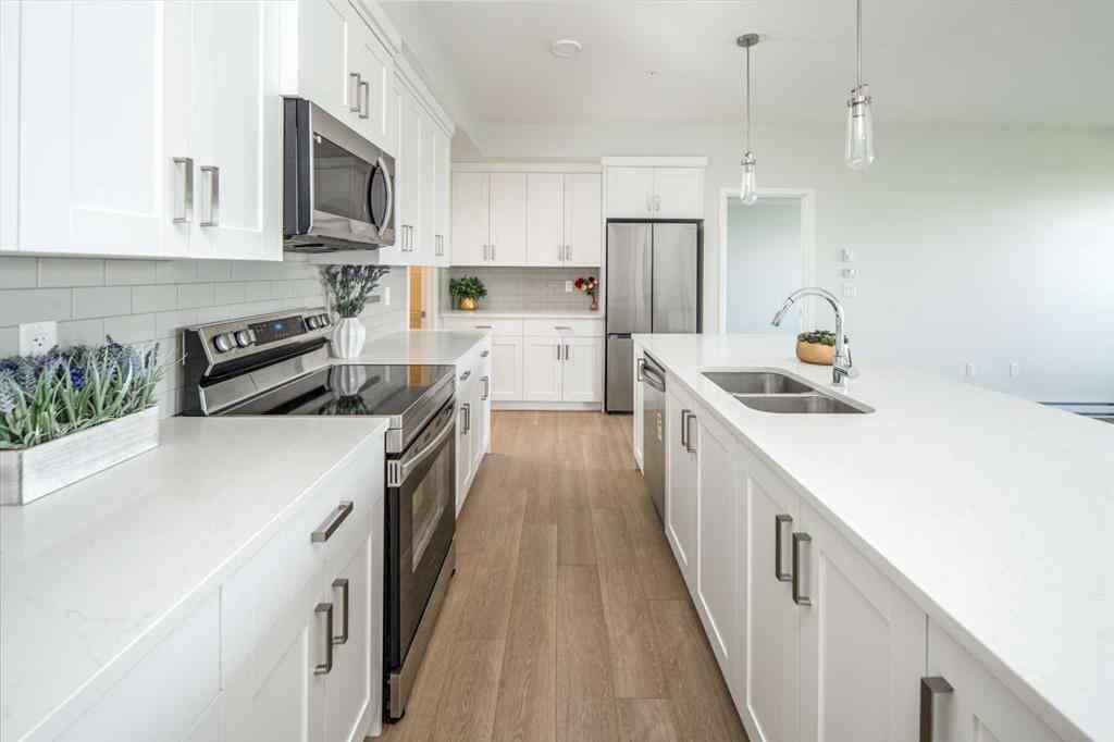 MLS® A2250531 - Unit #1208 42 Cranbrook Gardens SE in Cranston Calgary, Residential