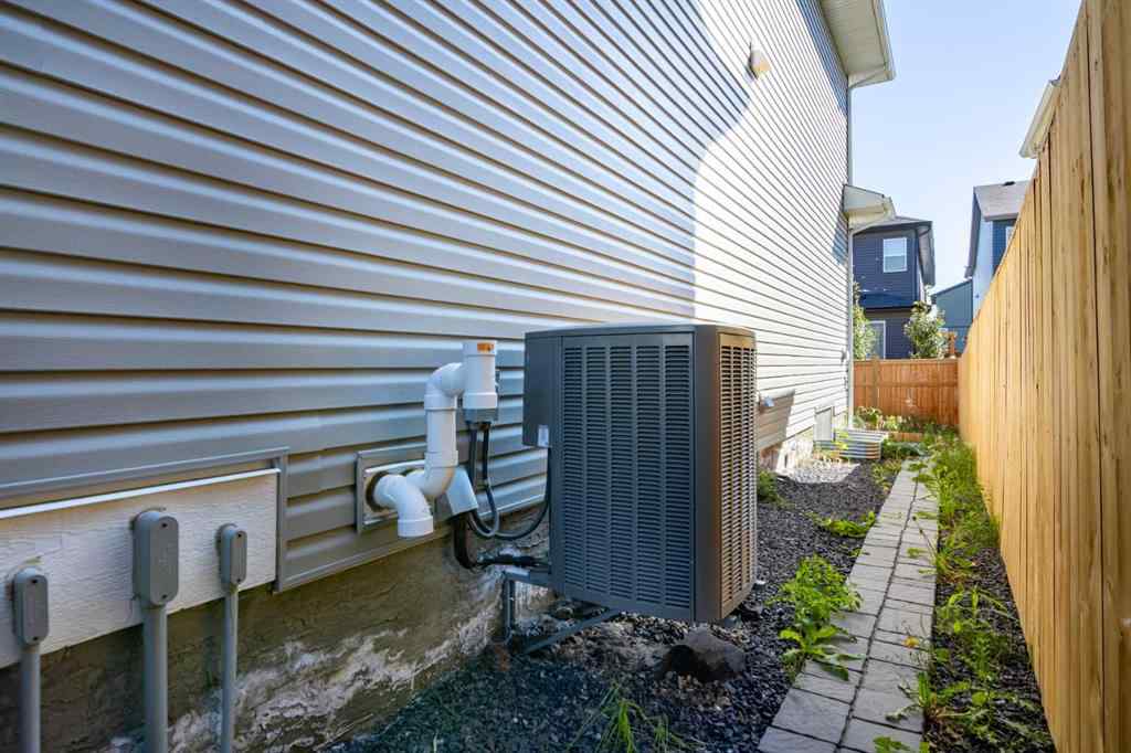 MLS® A2250532 - 21 Ambleside Crescent NW in Moraine Calgary, Residential