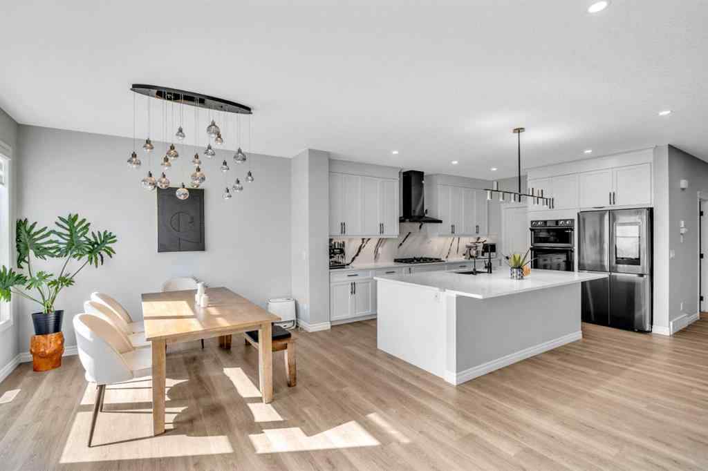 MLS® A2250532 - 21 Ambleside Crescent NW in Moraine Calgary, Residential