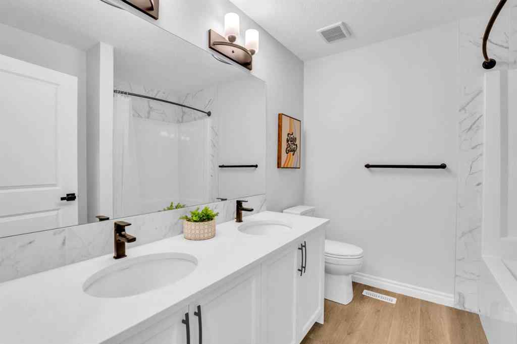 MLS® A2250532 - 21 Ambleside Crescent NW in Moraine Calgary, Residential