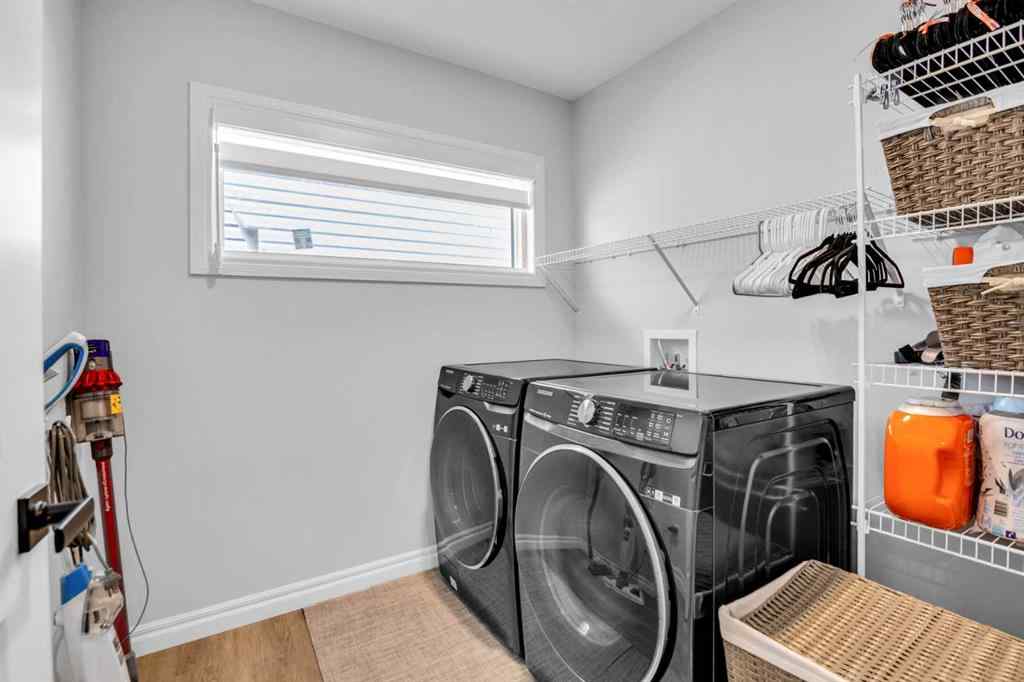 MLS® A2250532 - 21 Ambleside Crescent NW in Moraine Calgary, Residential