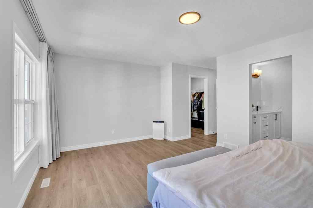 MLS® A2250532 - 21 Ambleside Crescent NW in Moraine Calgary, Residential