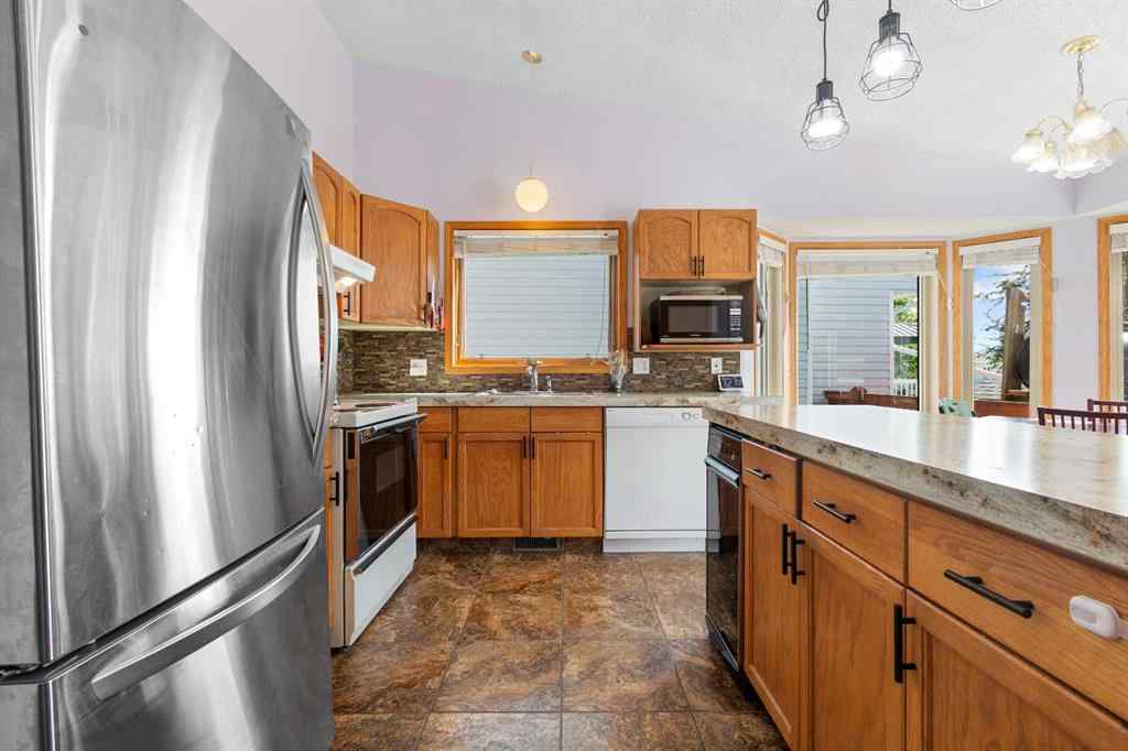 MLS® A2250545 - 9055 106 Avenue  in Crystal Heights Grande Prairie, Residential