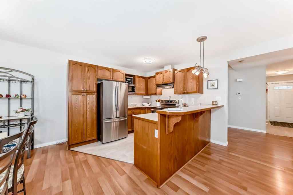 MLS® A2250547 - 1 Spring Meadows Bay  in Cimarron Meadows Okotoks, Residential