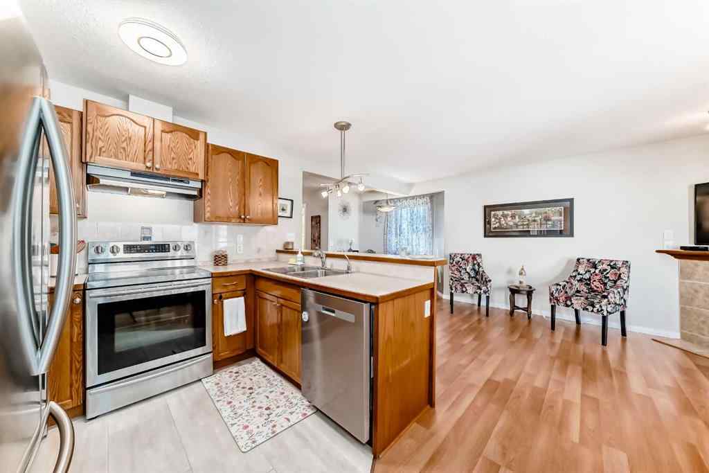 MLS® A2250547 - 1 Spring Meadows Bay  in Cimarron Meadows Okotoks, Residential