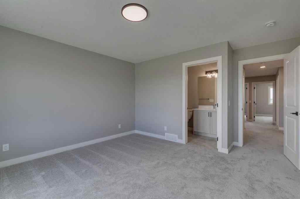 MLS® A2250554 - 469 Hotchkiss Drive SW in Hotchkiss Calgary, Residential