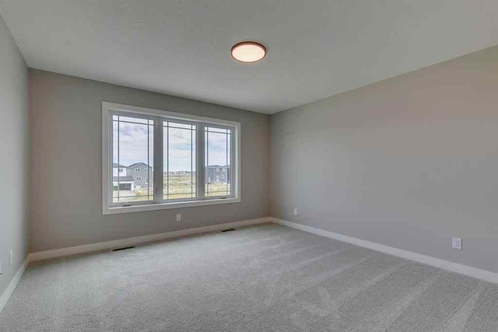 MLS® A2250554 - 469 Hotchkiss Drive SW in Hotchkiss Calgary, Residential