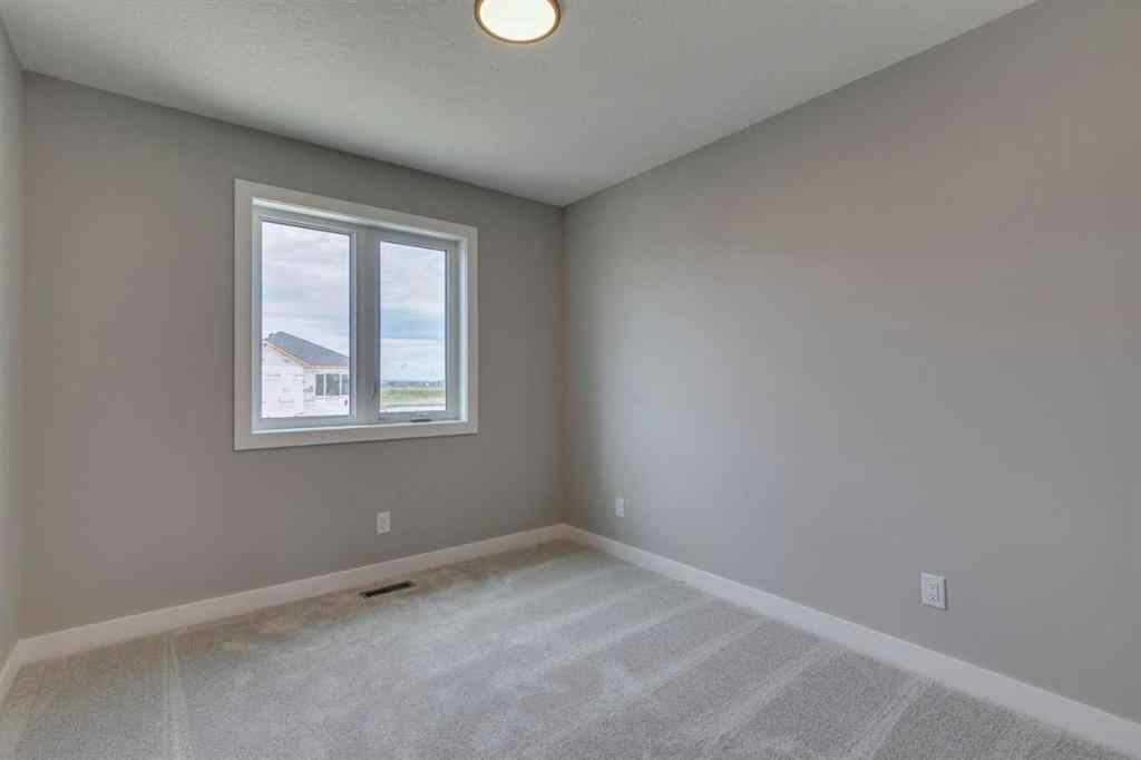 MLS® A2250554 - 469 Hotchkiss Drive SW in Hotchkiss Calgary, Residential