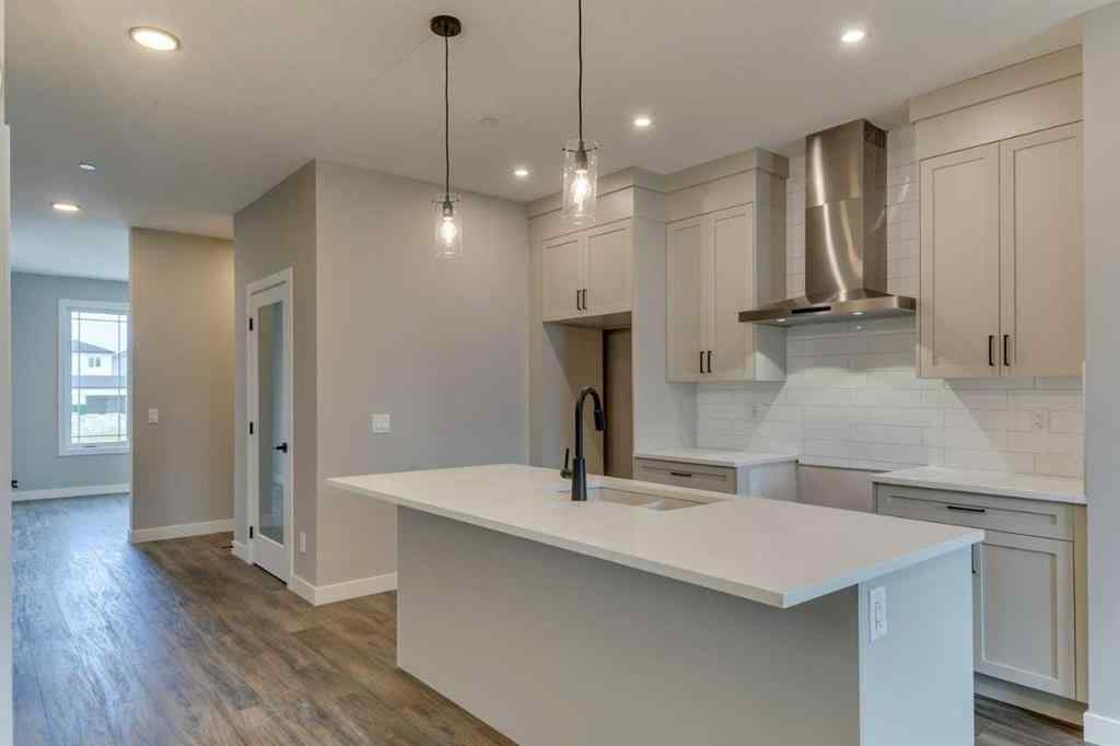 MLS® A2250554 - 469 Hotchkiss Drive SW in Hotchkiss Calgary, Residential