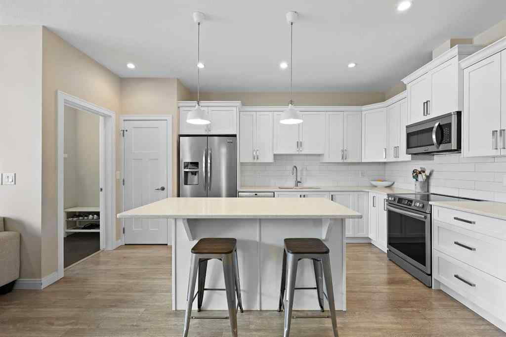 MLS® A2250560 - 130 Cooperswood Place SW in Coopers Crossing Airdrie, Residential