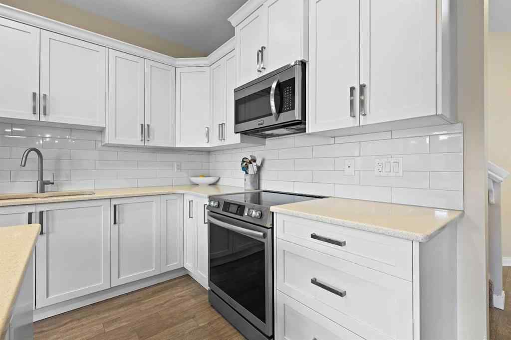 MLS® A2250560 - 130 Cooperswood Place SW in Coopers Crossing Airdrie, Residential