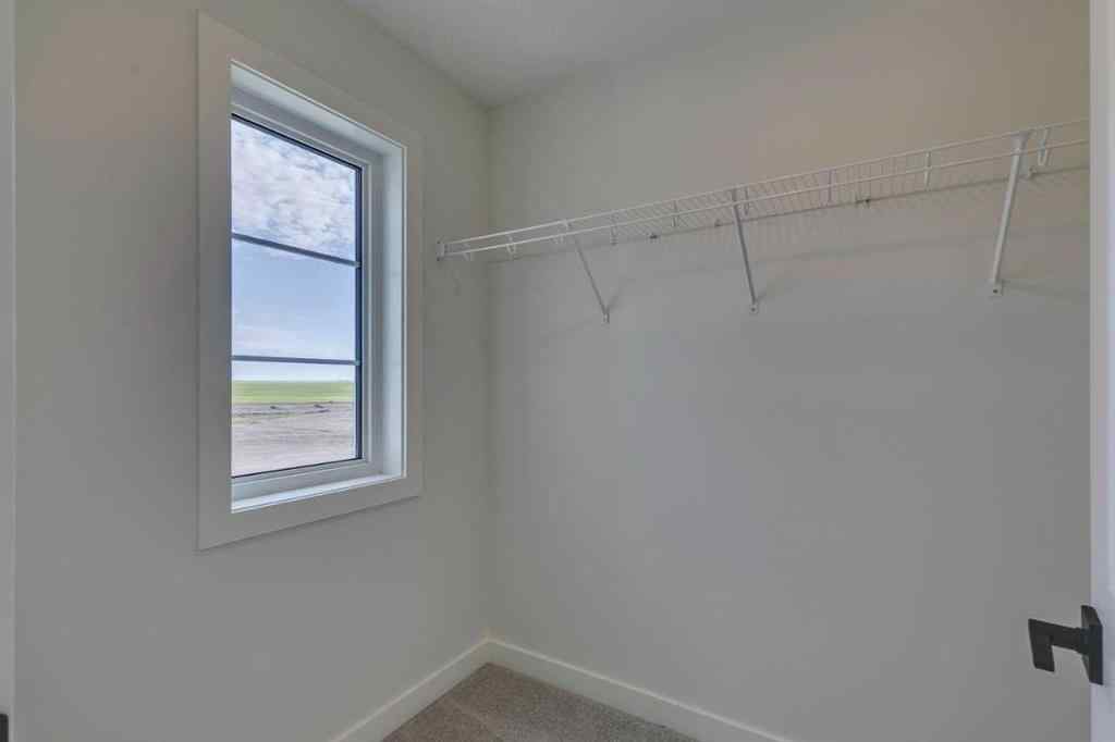 MLS® A2250571 - 49 Ambleton Boulevard NW in Moraine Calgary, Residential