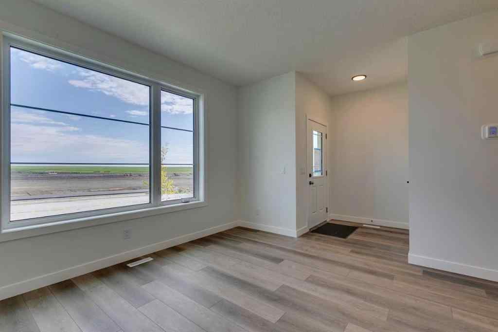 MLS® A2250571 - 49 Ambleton Boulevard NW in Moraine Calgary, Residential