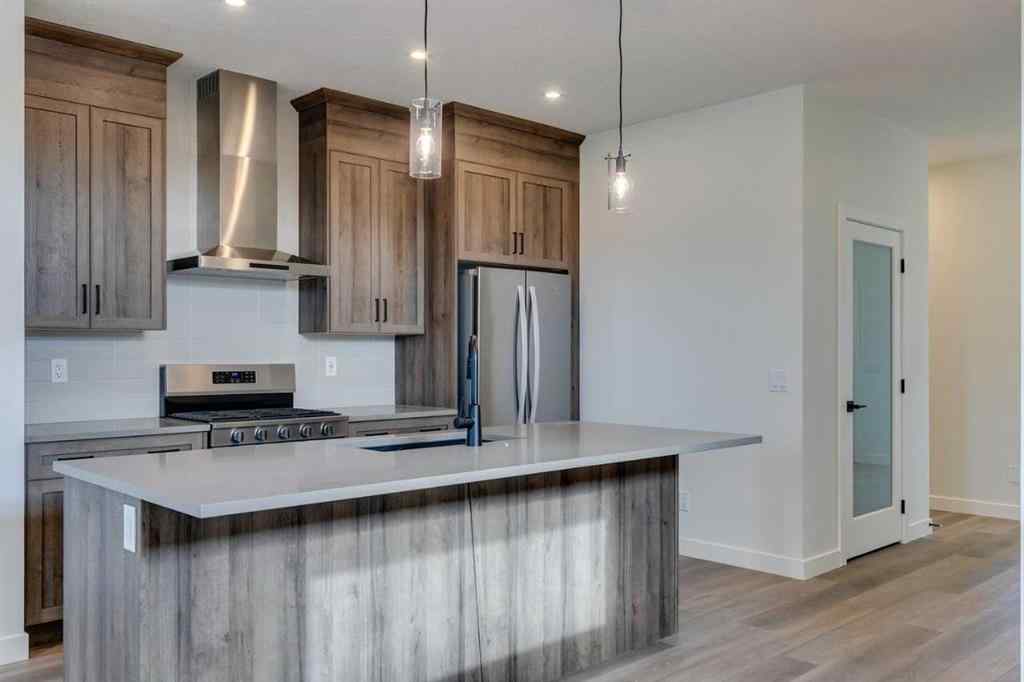 MLS® A2250571 - 49 Ambleton Boulevard NW in Moraine Calgary, Residential