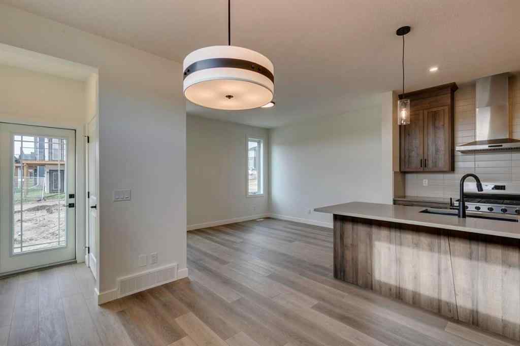 MLS® A2250571 - 49 Ambleton Boulevard NW in Moraine Calgary, Residential