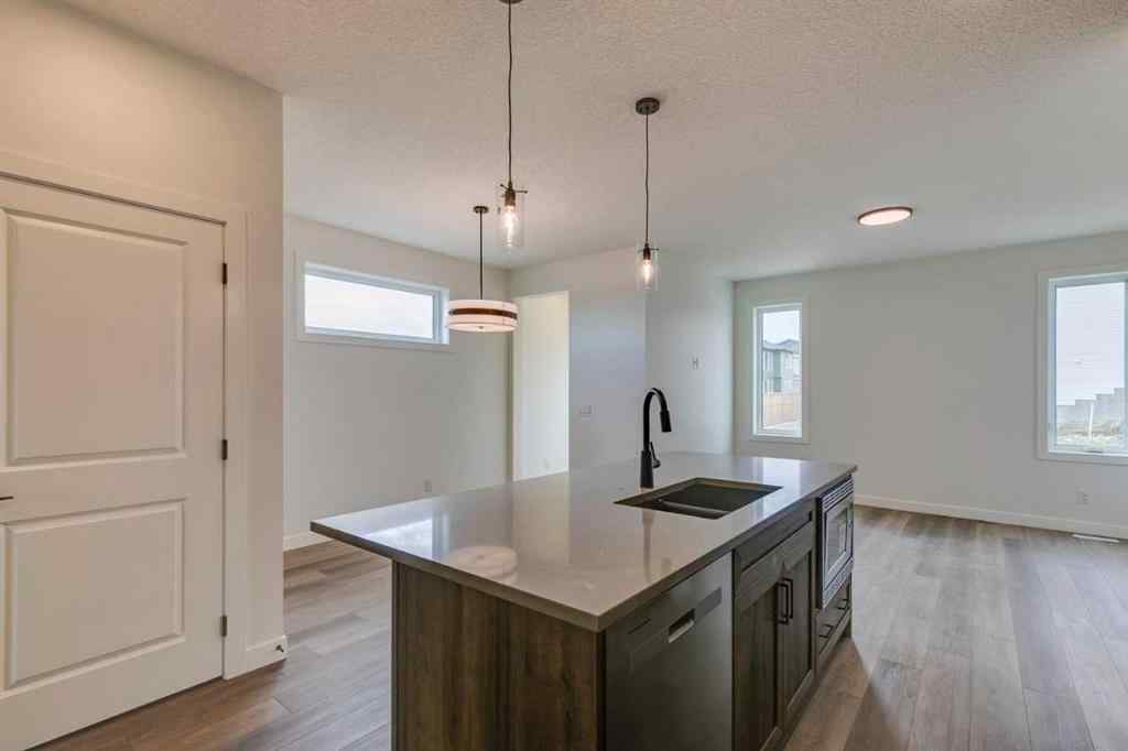 MLS® A2250571 - 49 Ambleton Boulevard NW in Moraine Calgary, Residential