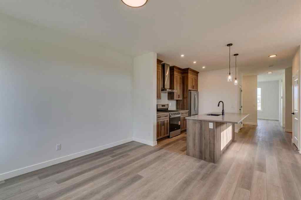 MLS® A2250571 - 49 Ambleton Boulevard NW in Moraine Calgary, Residential