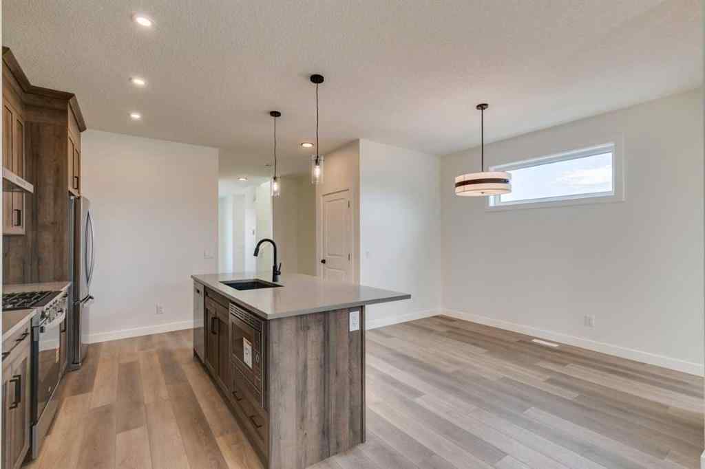 MLS® A2250571 - 49 Ambleton Boulevard NW in Moraine Calgary, Residential
