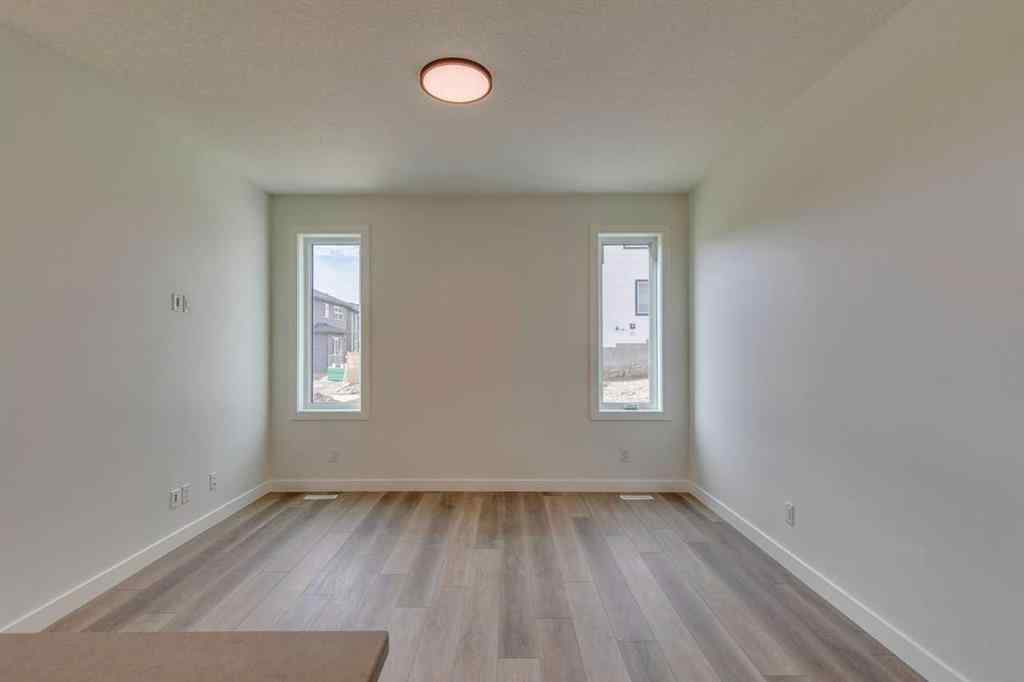 MLS® A2250571 - 49 Ambleton Boulevard NW in Moraine Calgary, Residential