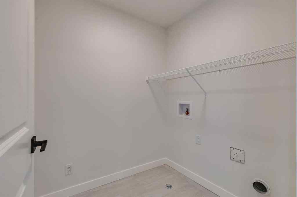 MLS® A2250571 - 49 Ambleton Boulevard NW in Moraine Calgary, Residential