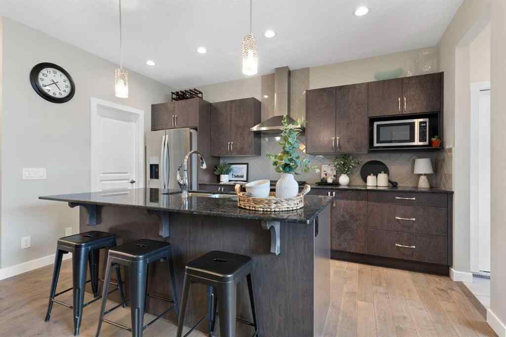 MLS® A2250576 - 452 Hillcrest Manor SW in Hillcrest Airdrie, Residential