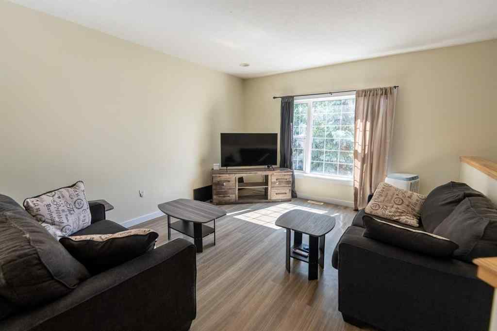 MLS® A2250579 - 10906 98 Avenue  in NONE La Crete, Multi-Family