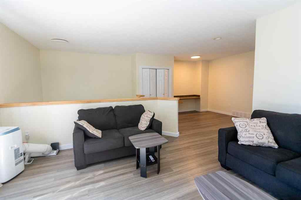 MLS® A2250579 - 10906 98 Avenue  in NONE La Crete, Multi-Family