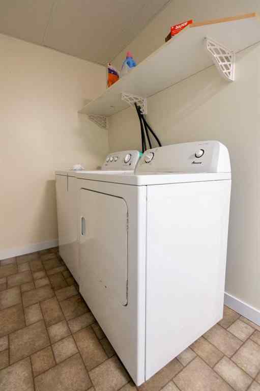 MLS® A2250579 - 10906 98 Avenue  in NONE La Crete, Multi-Family