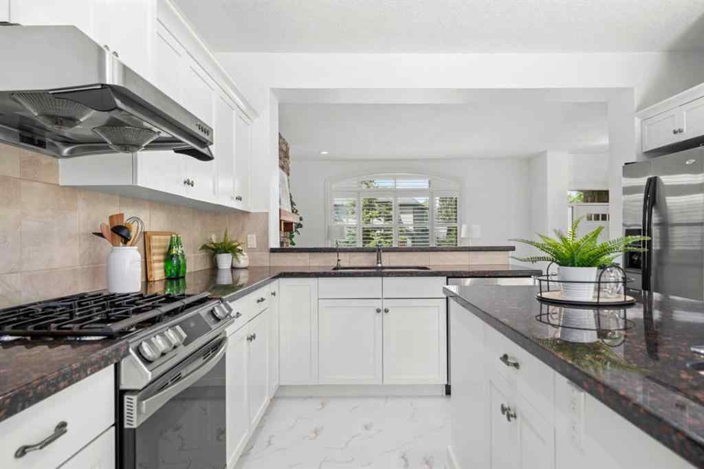 MLS® A2250587 - 15 Spring Willow Way SW in Springbank Hill Calgary, Residential